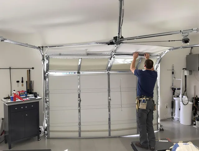 Laguna Niguel Garage Door Repair specialist performing precise section replacement on Laguna Niguel garage door